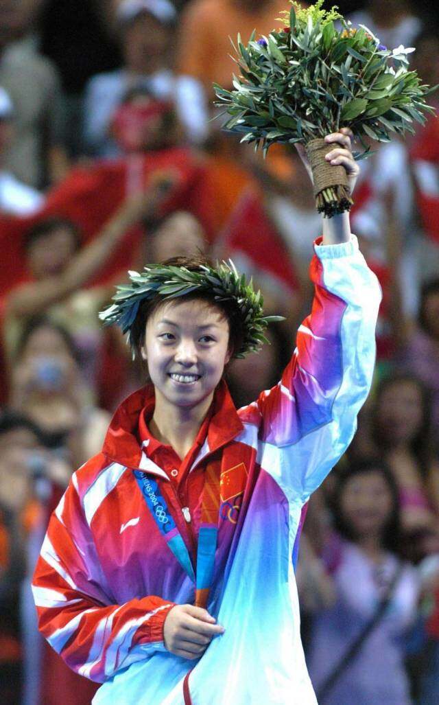 2004年8月22日，在雅典奧運會乒乓球女子單打決賽中，中國選手張怡寧奪得冠軍。新華社記者 徐家軍 攝